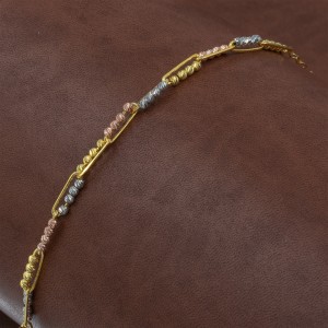 Classic Silver Bracelet in Gold Color With a Fantastic Design Decorated with Groups of Colored Beads Classic Silver Bracelet in Gold Color With a Fantastic Design Decorated with Groups of Colored Beads