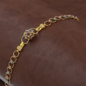 Silver Bracelet with Brightly Colored Circular Balls in a Chain of Connected Rings Silver Bracelet with Brightly Colored Circular Balls in a Chain of Connected Rings