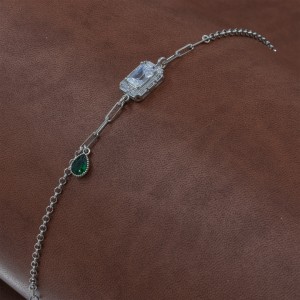 Elegant Women's Silver Hand Bracelet with Clear Zircon Stone and Teardrop Emerald Stone Elegant Women's Silver Hand Bracelet with Clear Zircon Stone and Teardrop Emerald Stone